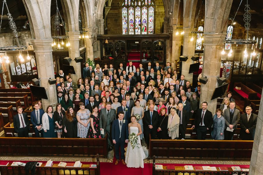 large group of guests in church interior