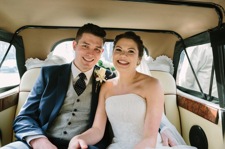 bride and groom in wedding car in cheshire