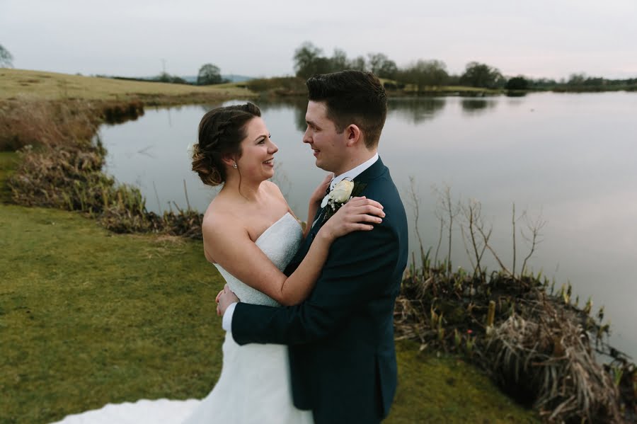 bride and groom at sandhole oak barn wedding lake 1
