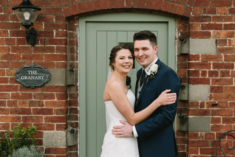 bride and groom at sandhole oak barn wedding x