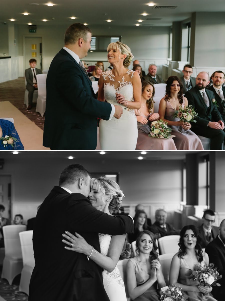bride and groom embrace at Quay hotel and spa wedding