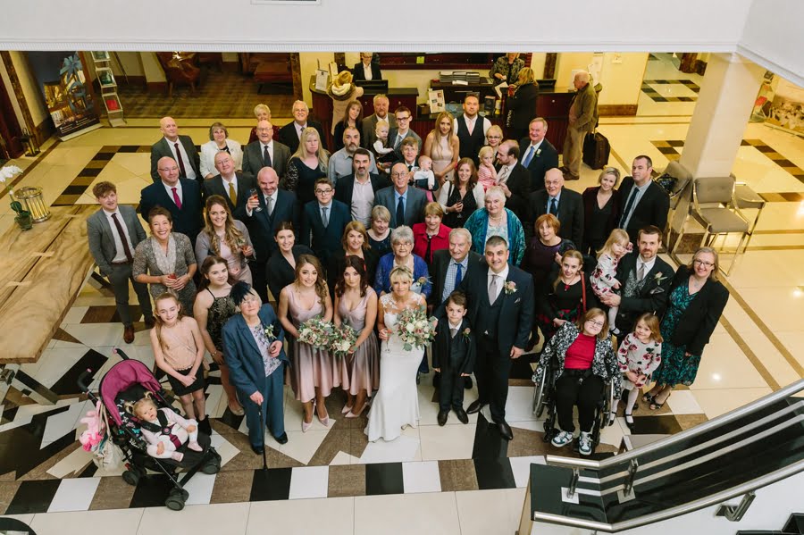large family group photograph at Quay hotel and spa wedding