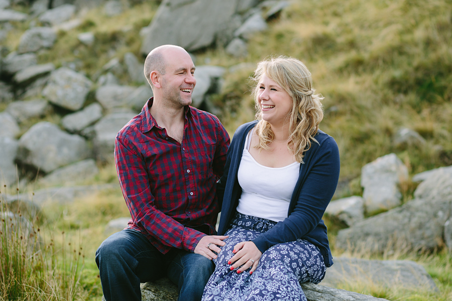 engaged couple laughing