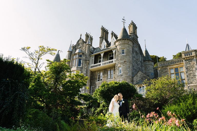 bride and groom outside Chateau Rhianfa