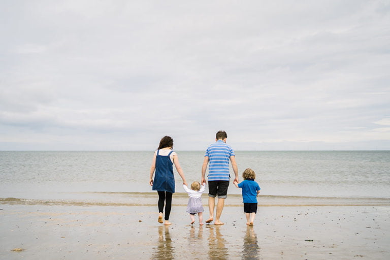 fun family portraits on the beach