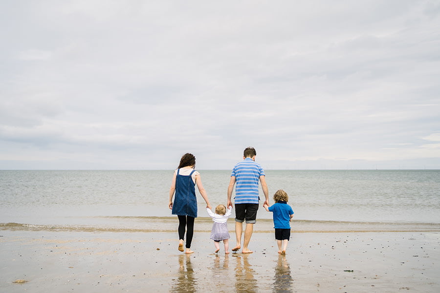 fun family portraits on the beach